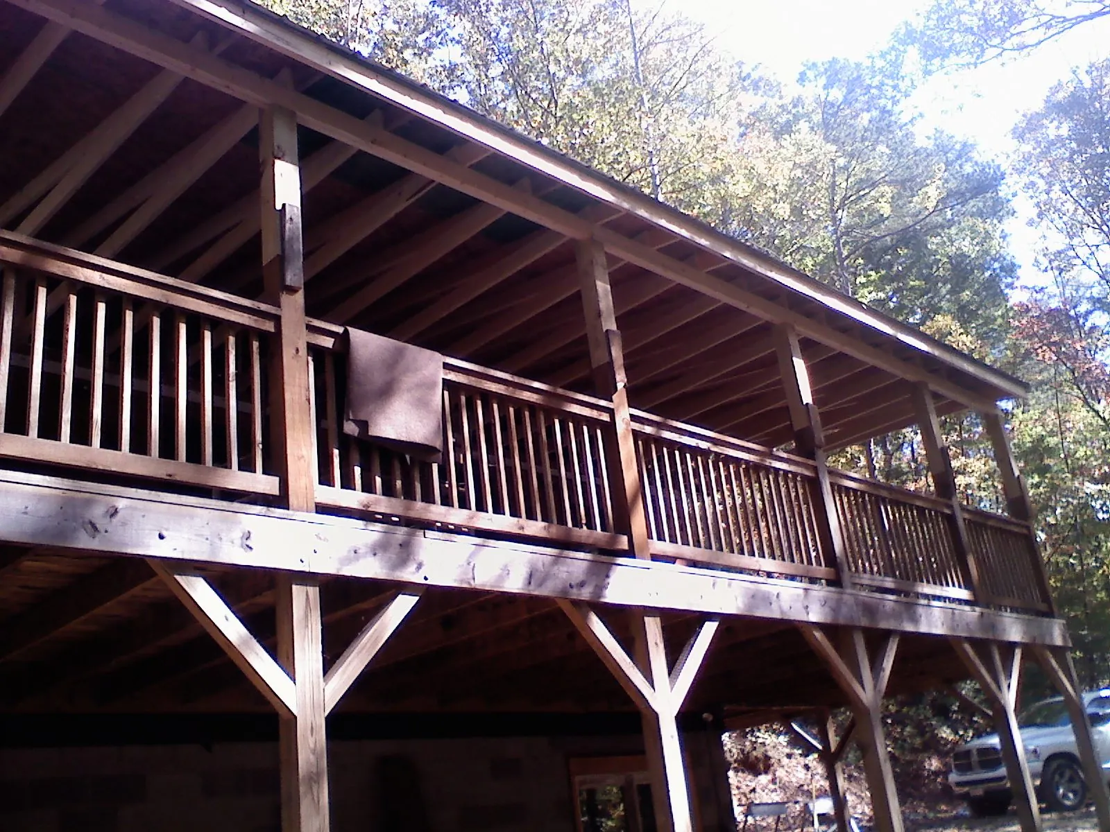 Timber framing under a new elevated porch and deck — Roof Leak Repair in Nichols by Roofing Brothers